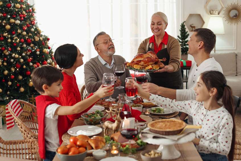 family enjoying Christmas dinner