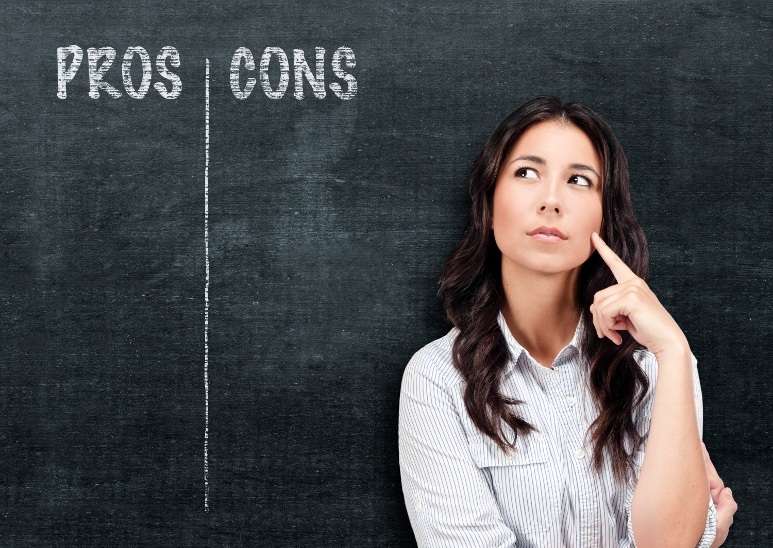 Woman thinking of pros and cons of sofa beds